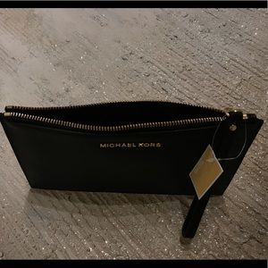 Michael Kors Bags - MICHAEL KORS leather pouch . Michael Kors Bags - MICHAEL KORS leather pouch .